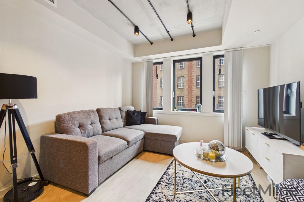 Property photo 1 of 18 Living Area