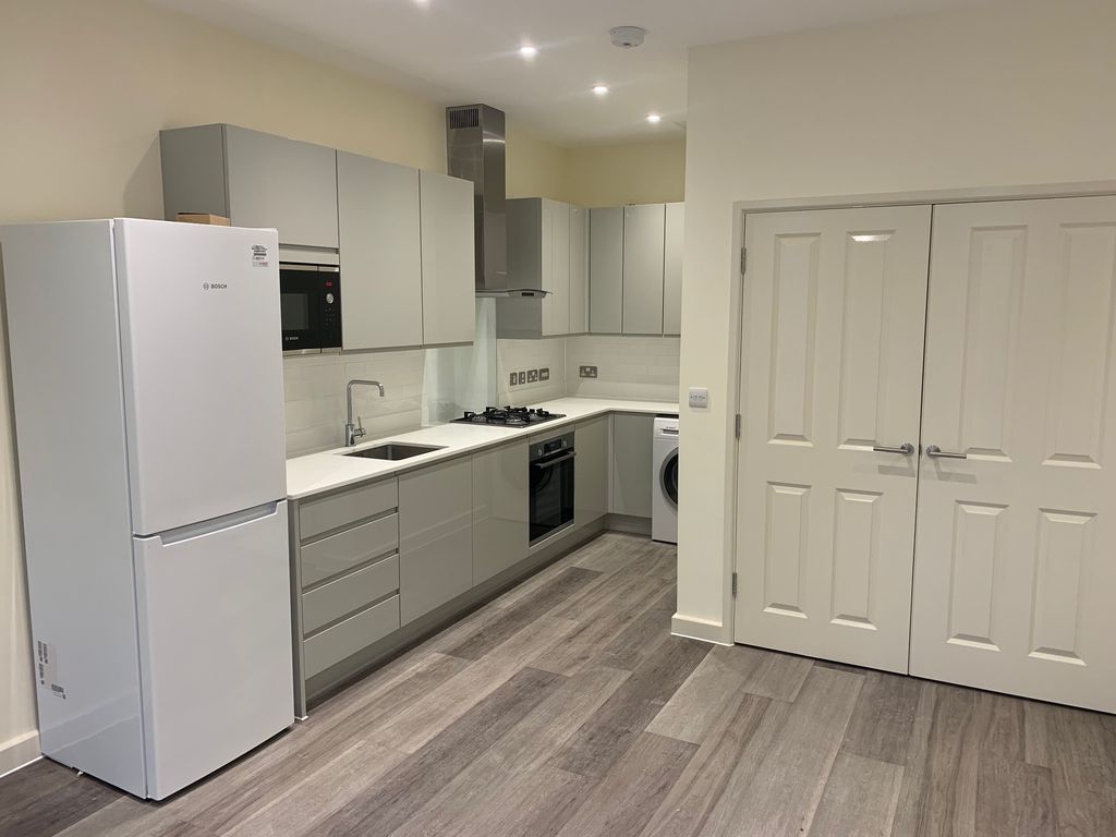 Property photo 2 of 6 Kitchen Area