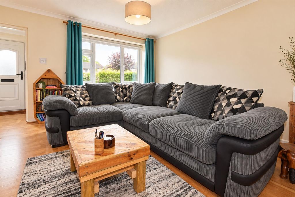 Property photo 2 of 10 Cosy Grey Sectional Living Room.Png