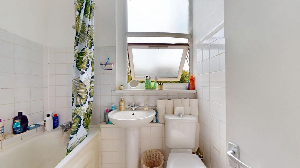 Property photo 3 of 15 Bright Bathroom With Large Window And Bath...