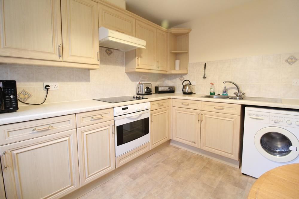 Property photo 3 of 8 Kitchen