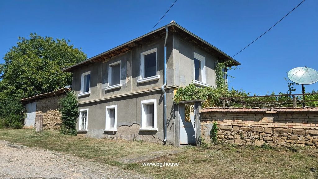 Property photo 1 of 80 Two-Storey House With Six Visible Windows And A Metal Downspout On The Corner