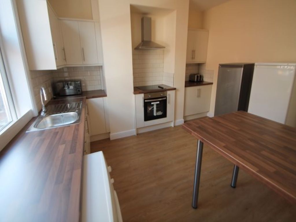 Property photo 2 of 10 Bright And Tidy Kitchen Featuring Modern Appliance...
