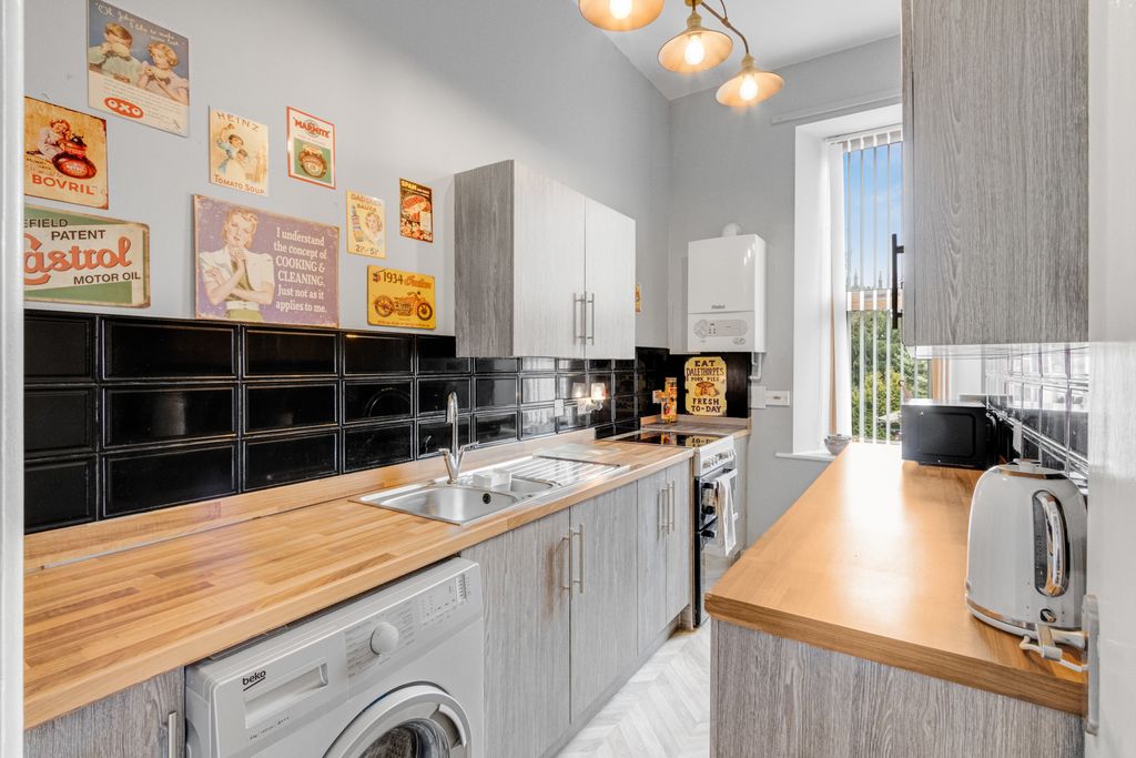 Property photo 3 of 13 Kitchen