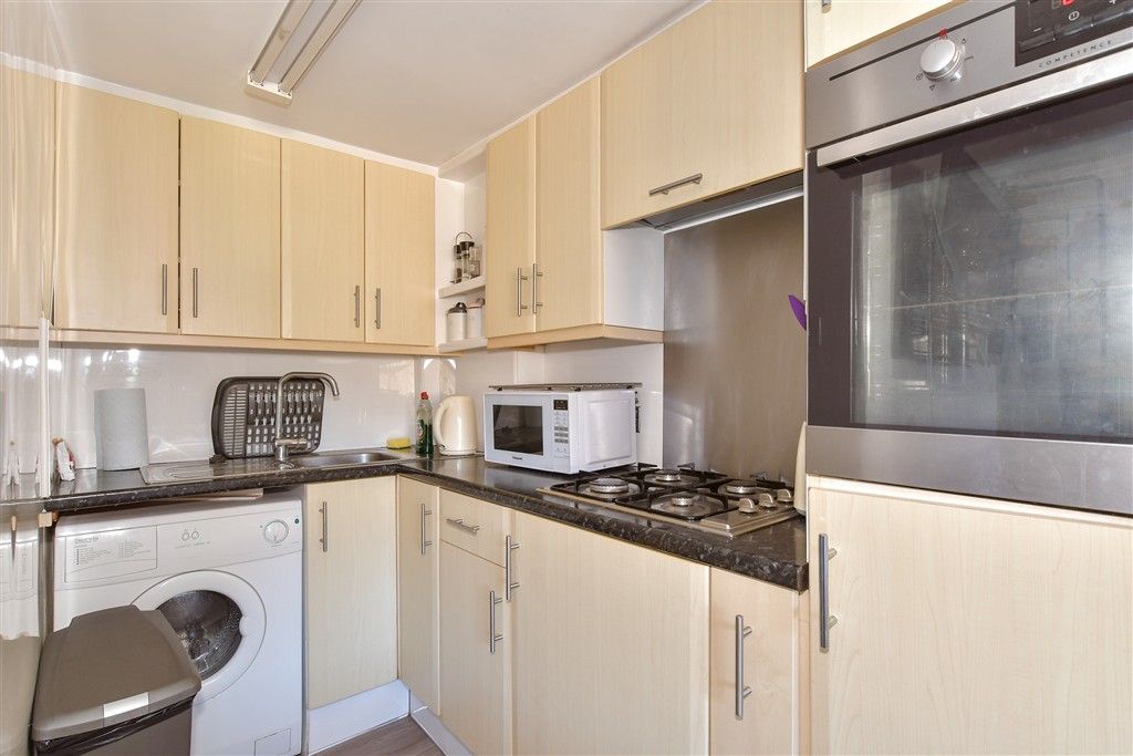 Property photo 2 of 7 Kitchen/Living Area