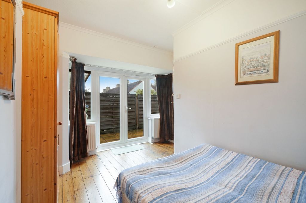 Property photo 3 of 15 Bright And Cozy Double Bedroom Featuring Polished ...