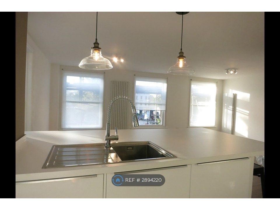 Property photo 3 of 8 Kitchen Living Room