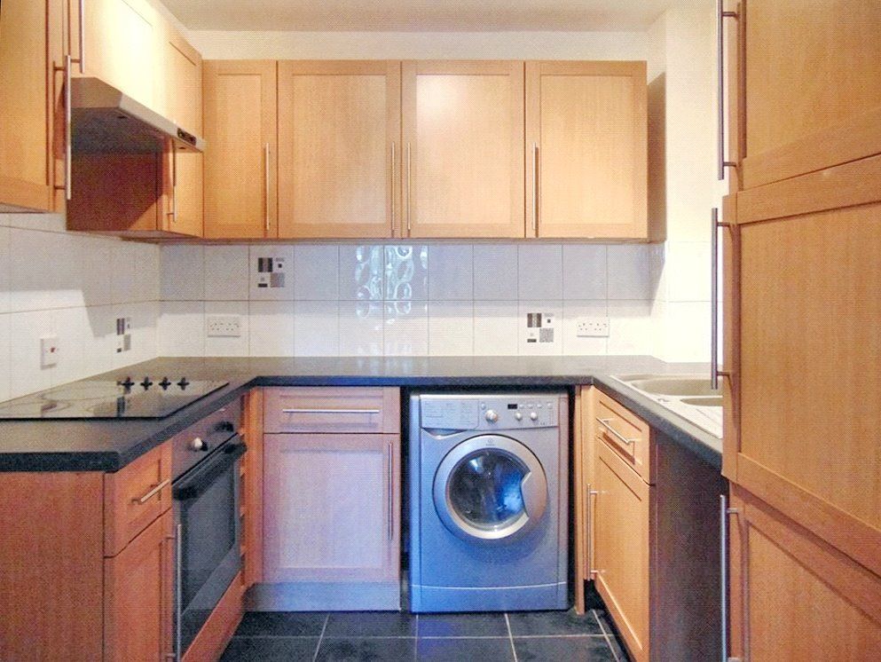 Property photo 3 of 9 Kitchen