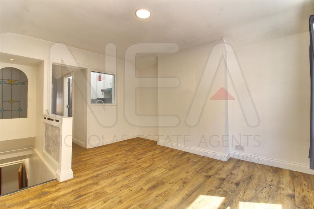 Property photo 2 of 7 Living Room (2) Wm.Jpg