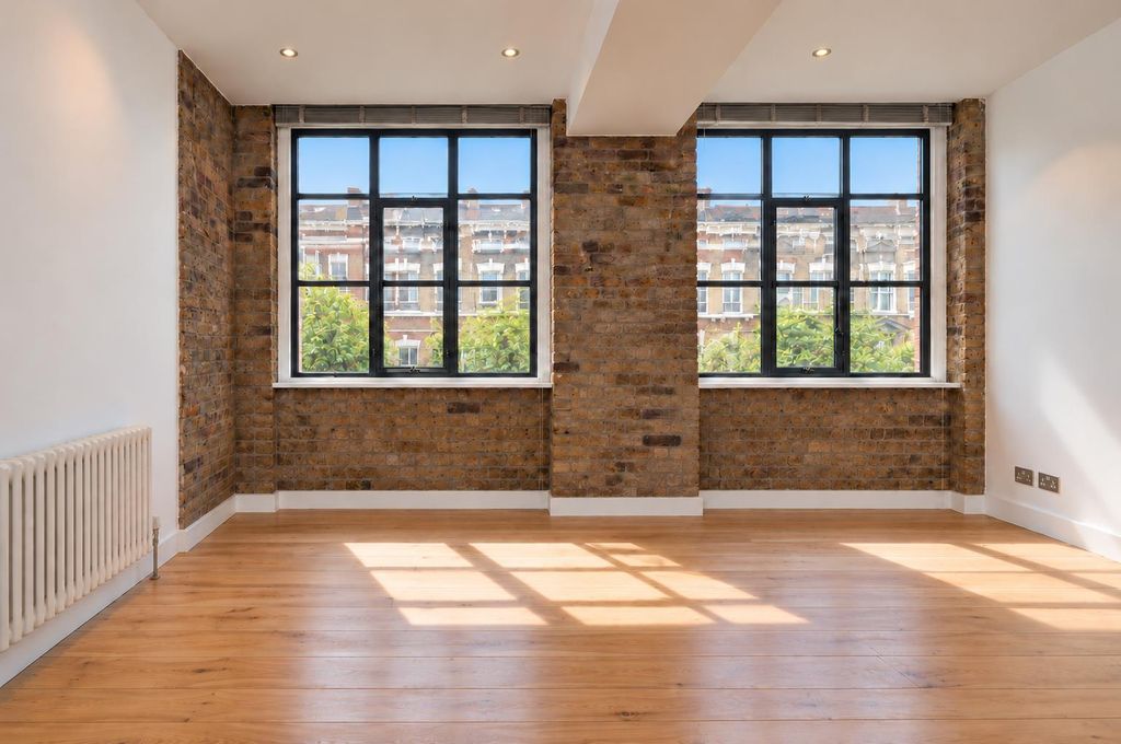 Property photo 2 of 7 Sunlit Industrial Loft Interior (1).Png