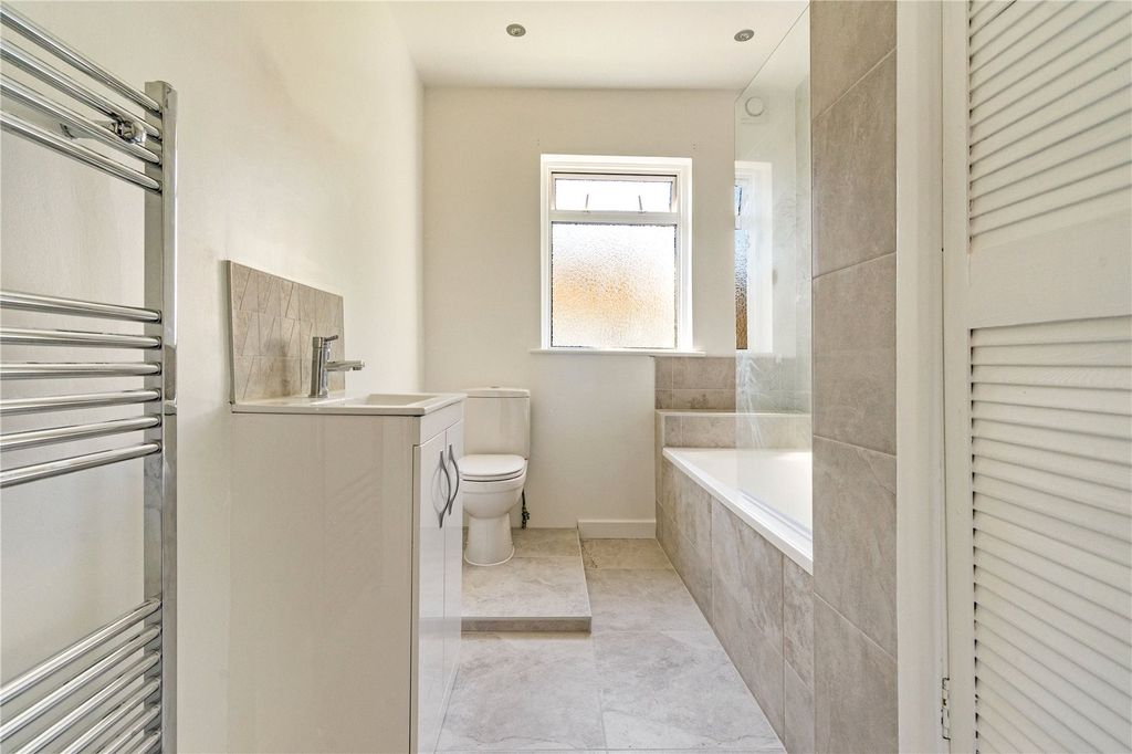 Property photo 3 of 9 New Bathroom