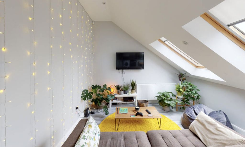 Property photo 2 of 6 Bright And Welcoming Living Room With Ample Natura...