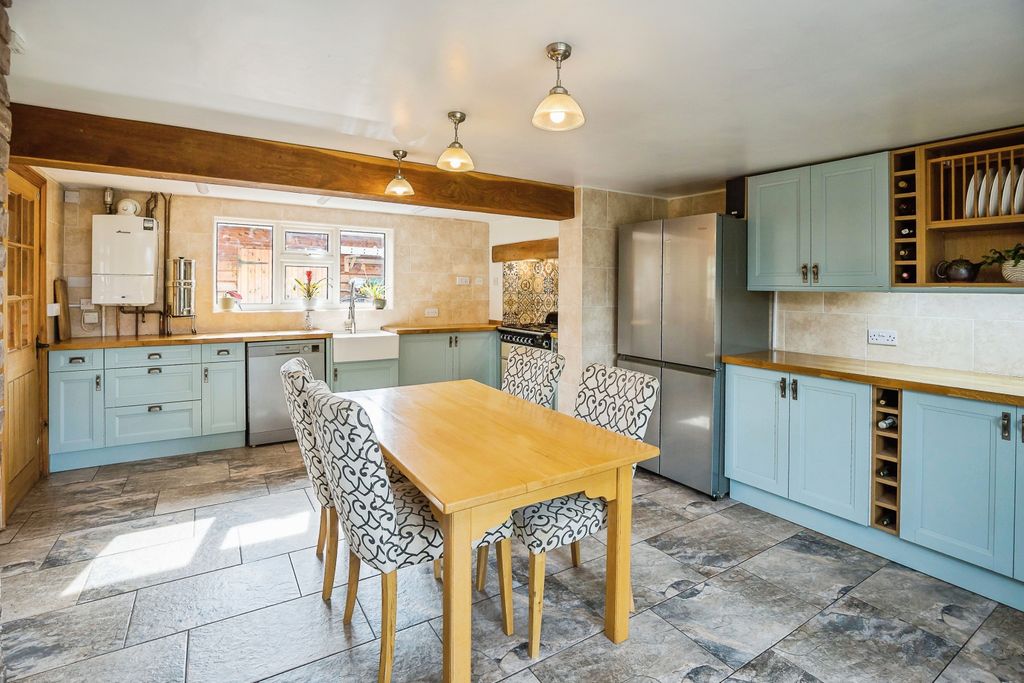 Property photo 2 of 28 Dining Kitchen