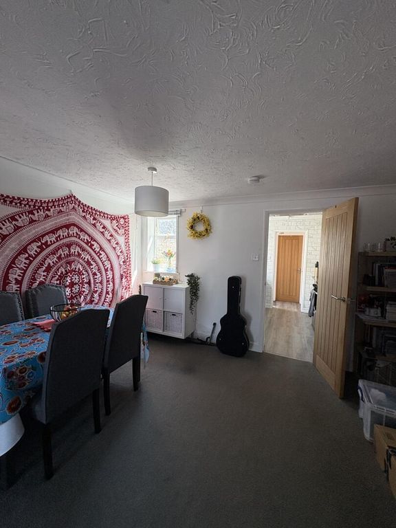 Property photo 3 of 8 Dining Room