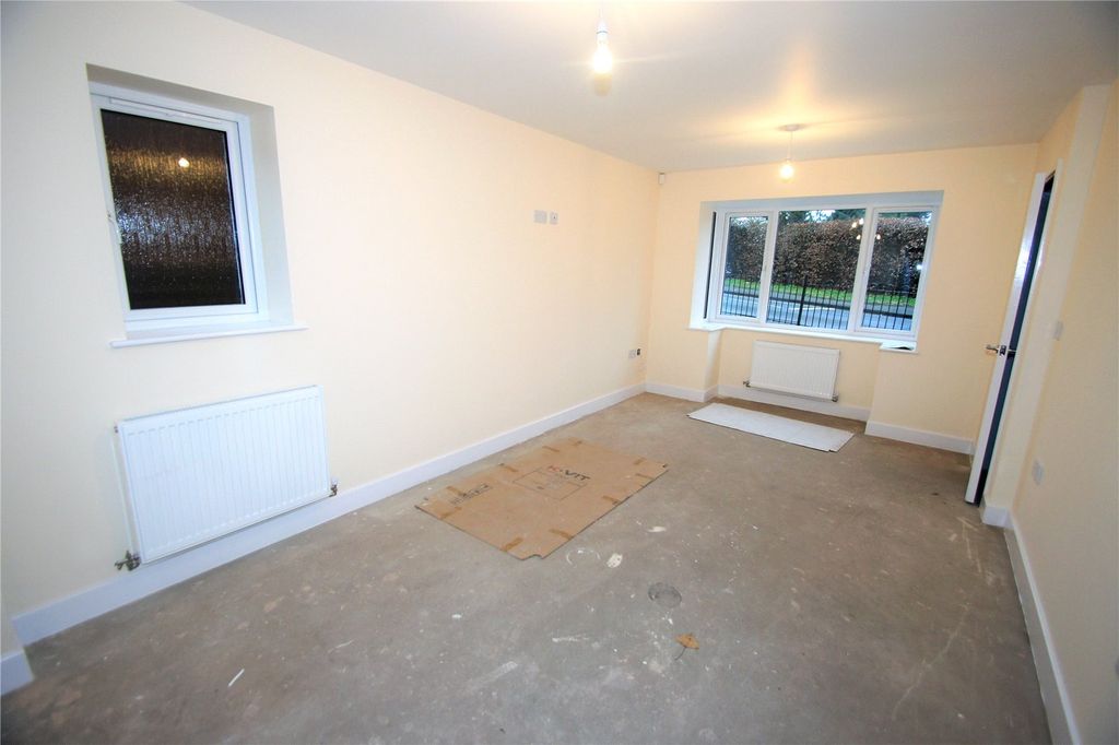 Property photo 3 of 11 Living Area
