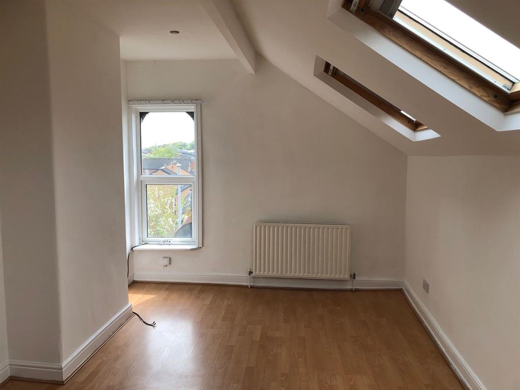 Property photo 3 of 7 Living Room: