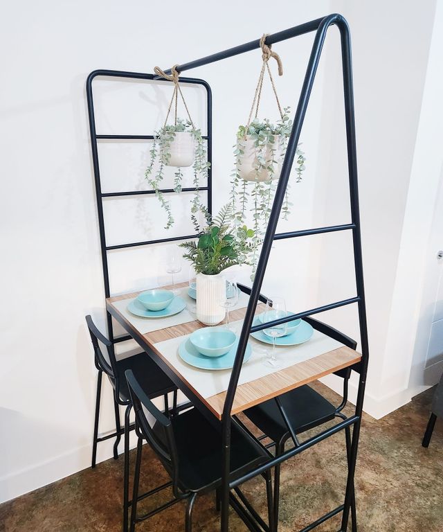 Property photo 3 of 26 Stylish Compact Dining Nook With A Wood Tabletop A...