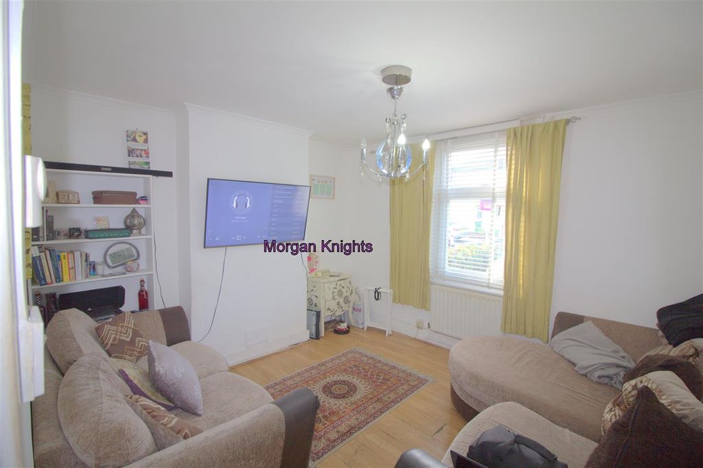 Property photo 2 of 12 Living Room: