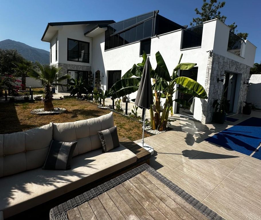 Property photo 3 of 25 Detached Stone Villa Near Seydikemer For Sale - Seating Area In The Garden