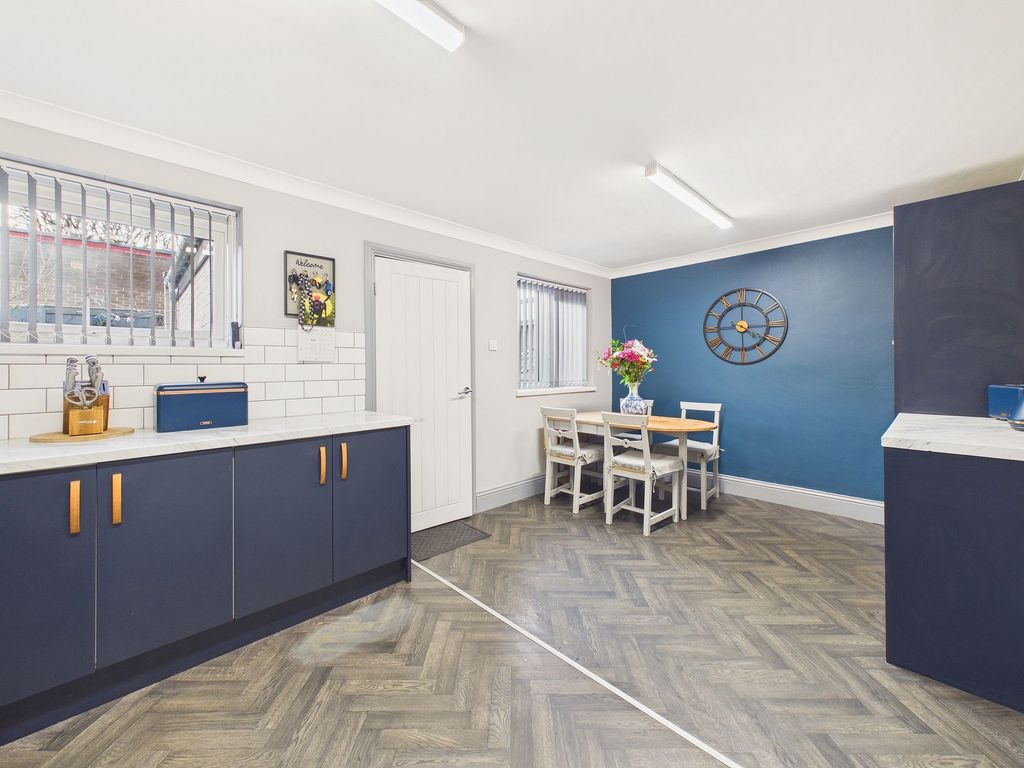 Property photo 1 of 12 Dining Kitchen