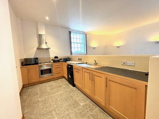 Property photo 2 of 12 Kitchen