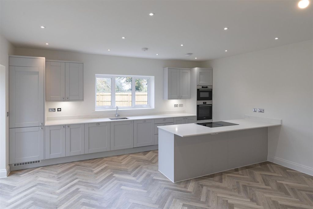 Property photo 2 of 26 Kitchen Area