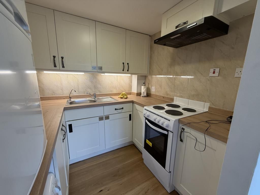 Property photo 3 of 8 Kitchen