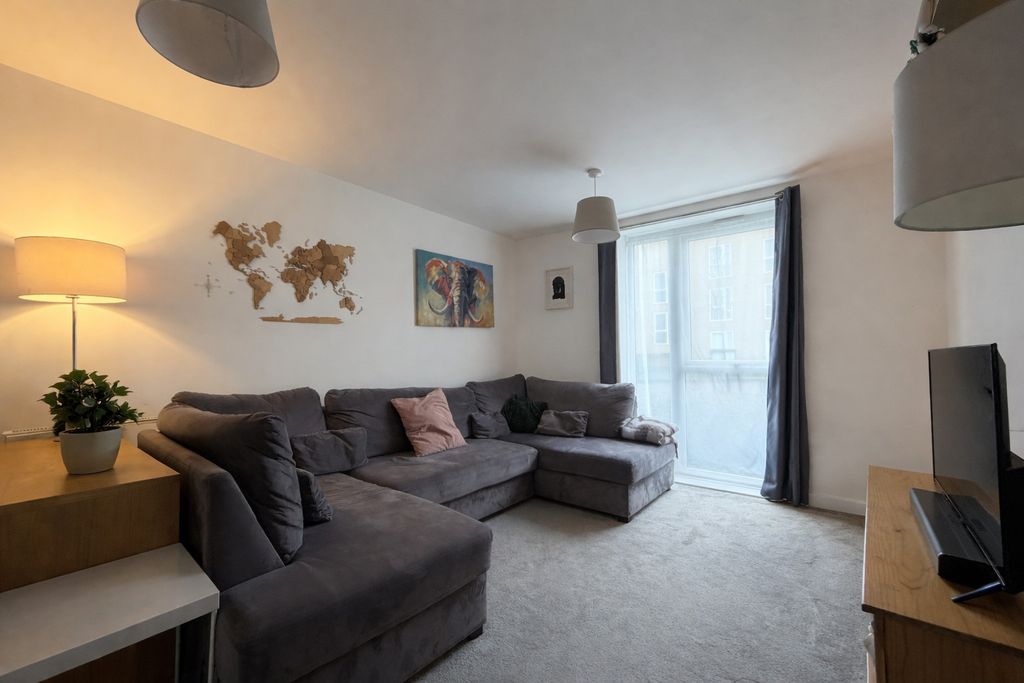 Property photo 3 of 13 Neutral Living Room With Grey Sofa