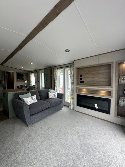 Property photo 1 of 7 Abi Ingleton Lounge With Grey Sofa, Feature Fireplace And French Doors