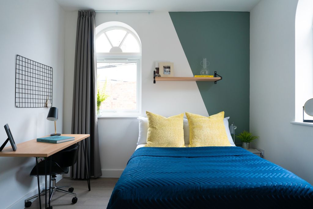 Property photo 3 of 7 A Bright And Welcoming Bedroom Featuring A Comfort...