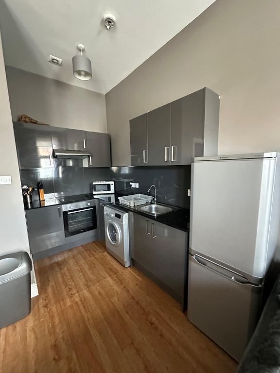Property photo 3 of 9 Kitchen