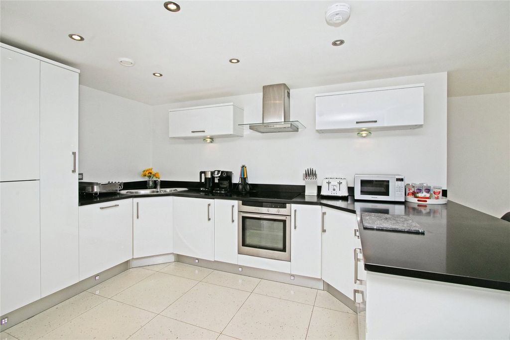 Property photo 3 of 36 Kitchen Area