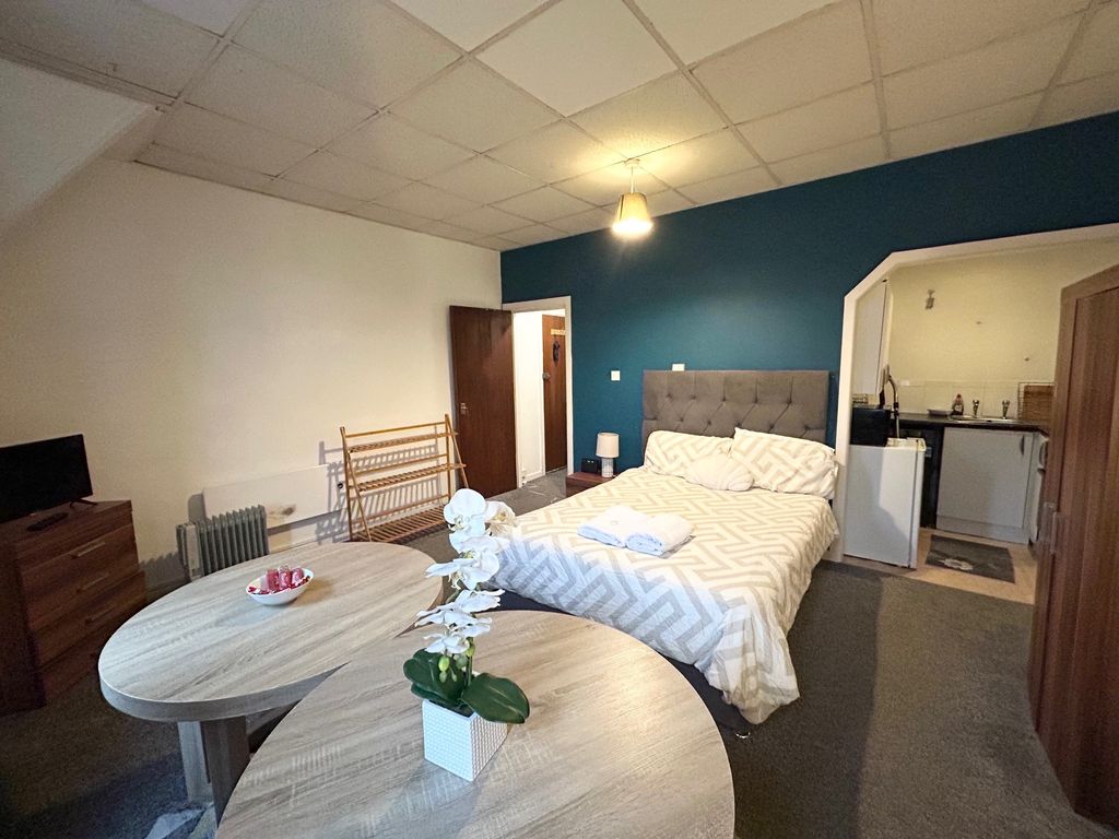 Property photo 3 of 8 Living Area