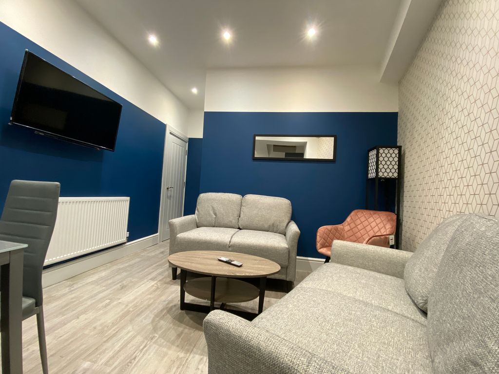 Property photo 2 of 12 Living 1.1