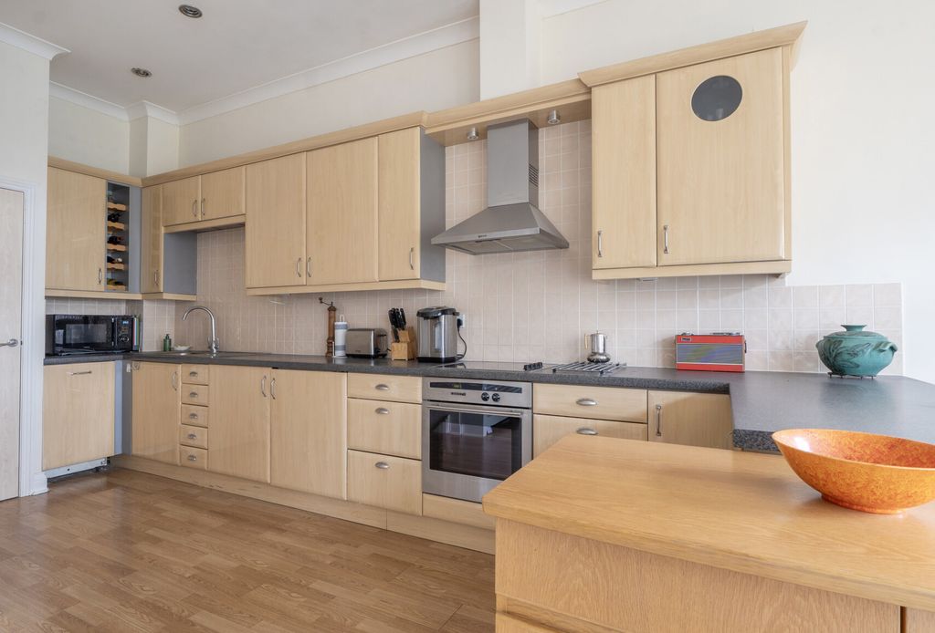 Property photo 3 of 16 Kitchen