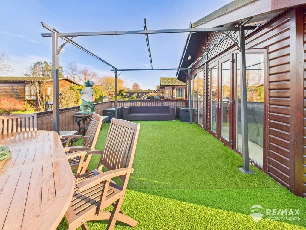 Property photo 2 of 18 Front Seating Area.Jpg