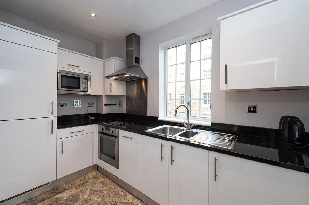 Property photo 2 of 12 Kitchen
