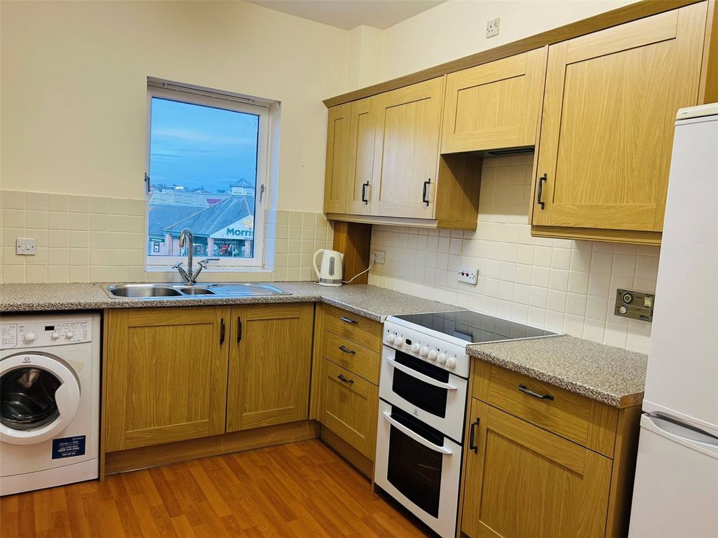 Property photo 3 of 9 Kitchen