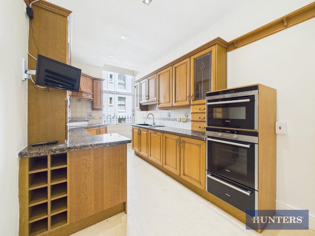 Property photo 2 of 12 Kitchen