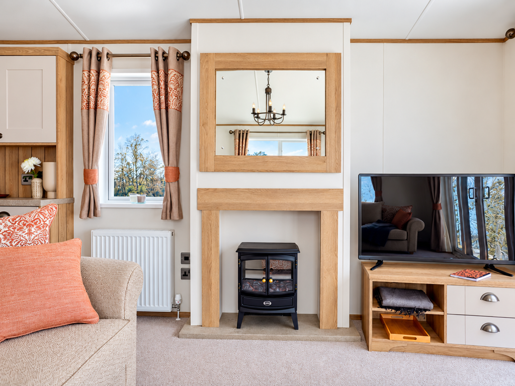 Property photo 2 of 5 Cosy Abi Ambleside Lounge With Feature Fireplace, Wall Mounted Tv And Stylish Furnishings