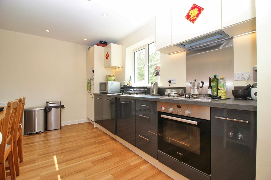 Property photo 2 of 13 Kitchen/Living Area