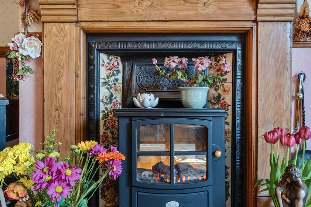 Property photo 2 of 17 Fireplace