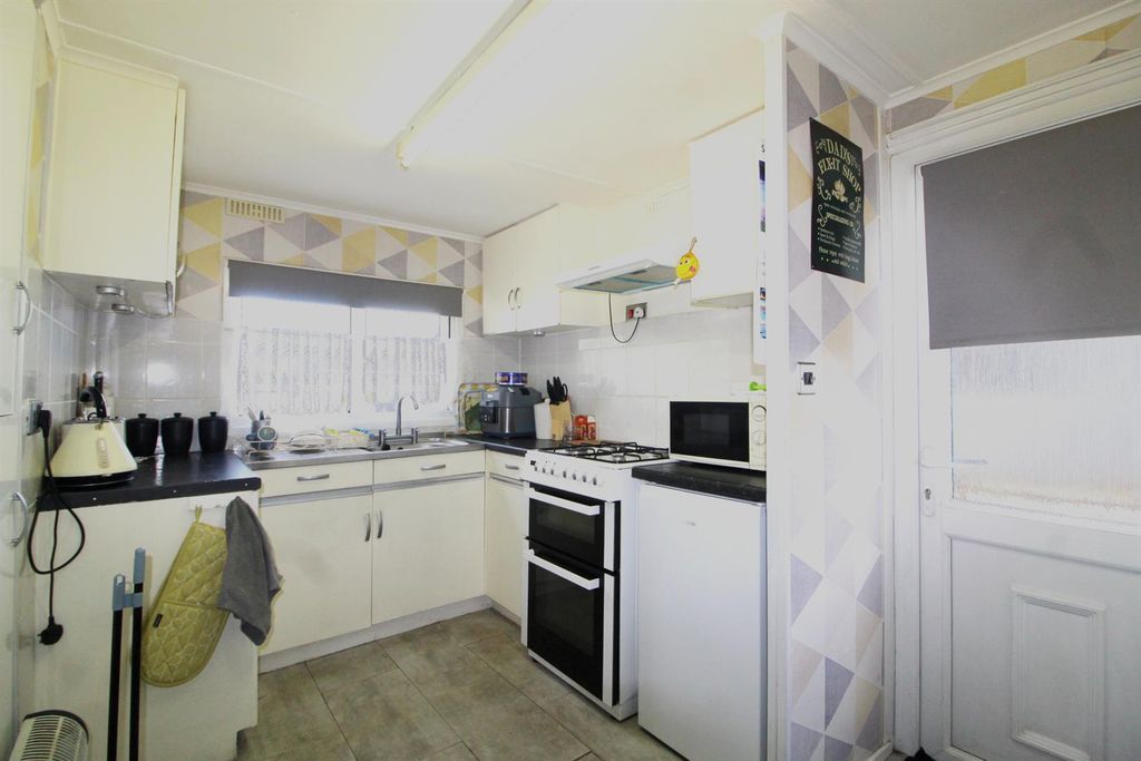 Property photo 3 of 7 E Kitchen.Jpg