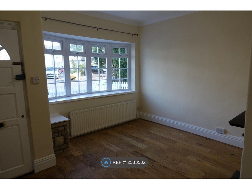 Property photo 3 of 12 Front Living Room