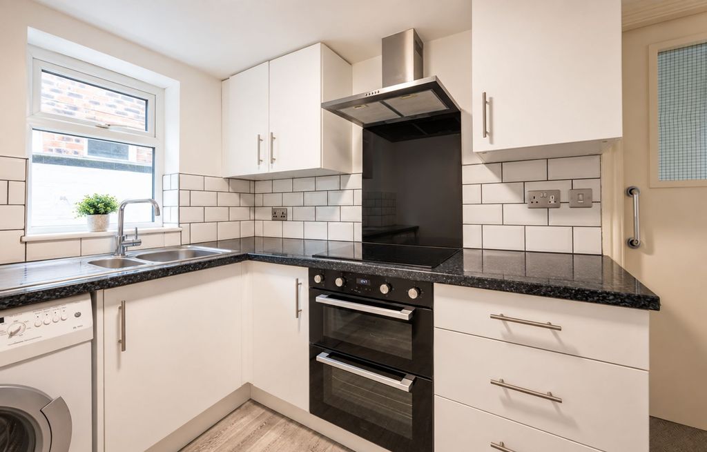 Property photo 3 of 13 Kitchen