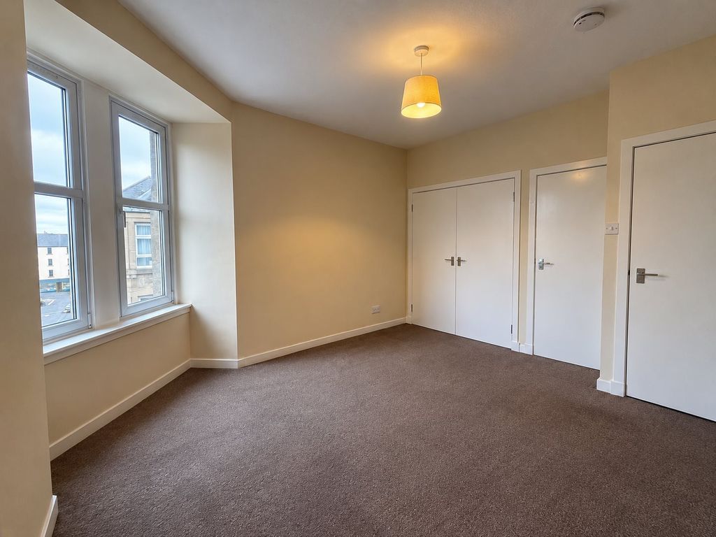 Property photo 1 of 5 Empty Beige Bedroom With Bay Windows And Doors
