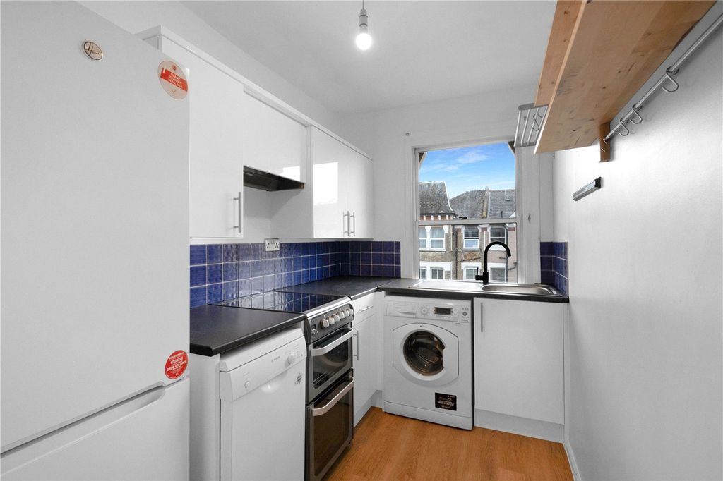 Property photo 3 of 8 Kitchen