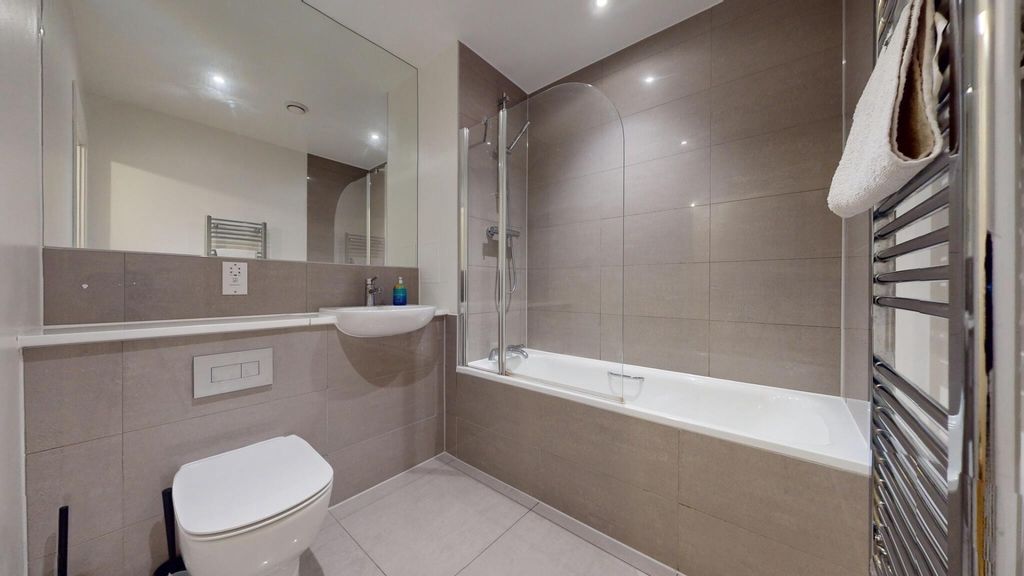 Property photo 3 of 15 Contemporary Bathroom With A Full Bathtub And Glas...