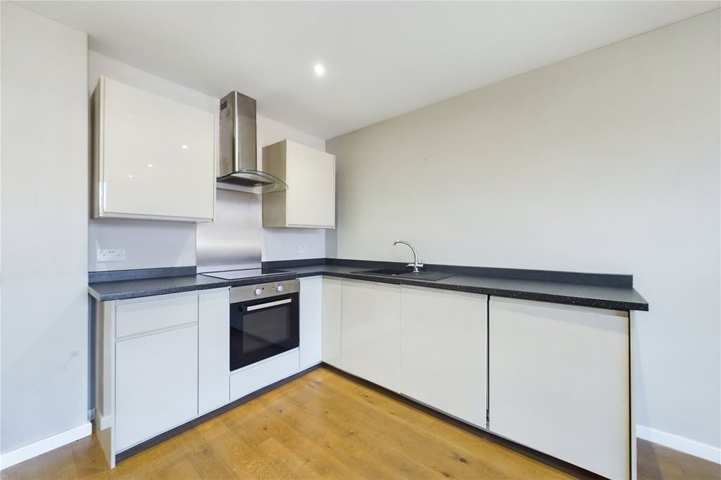Property photo 3 of 7 Kitchen Area