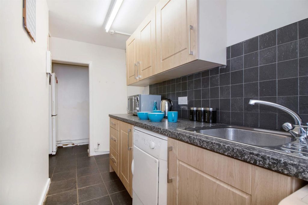 Property photo 2 of 10 Modern Kitchen With Stylish Splashback Tiles...